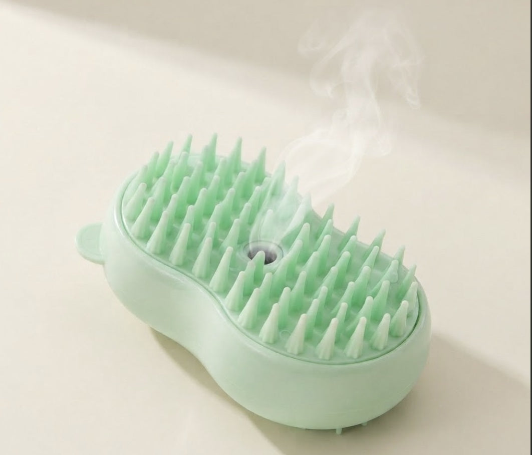 Cepillo de vapor para mascotas expulsando vapor por el orificio central